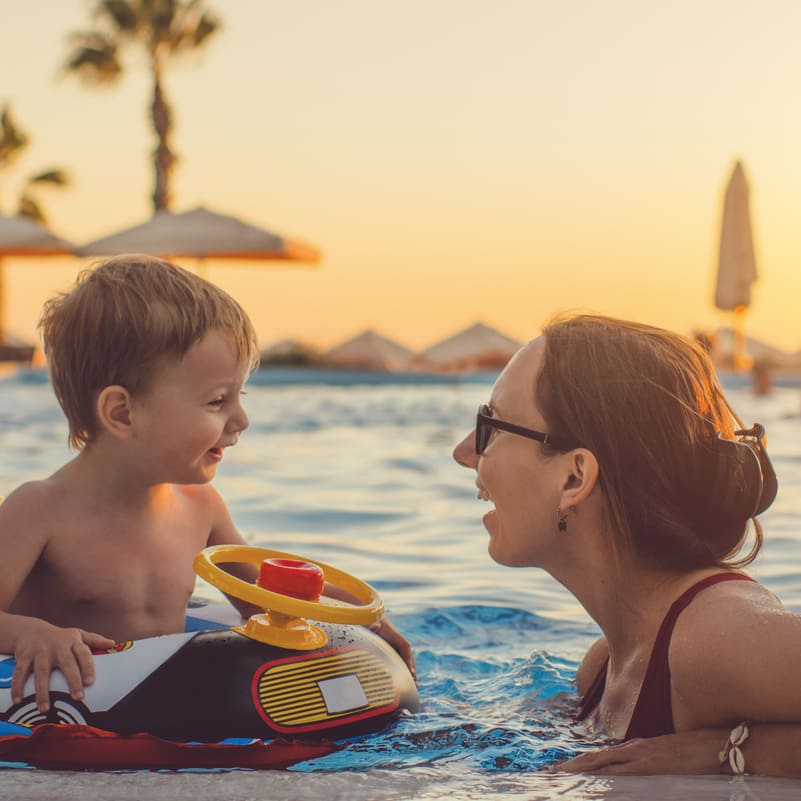 mother and son in pool