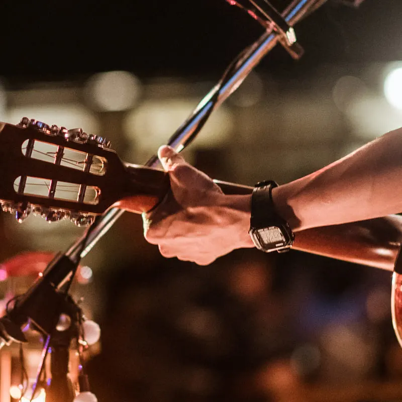 Guy holding guitar