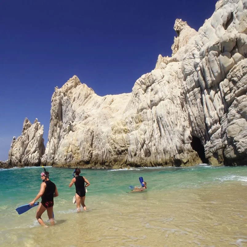 Tourists Swimming In Cabo