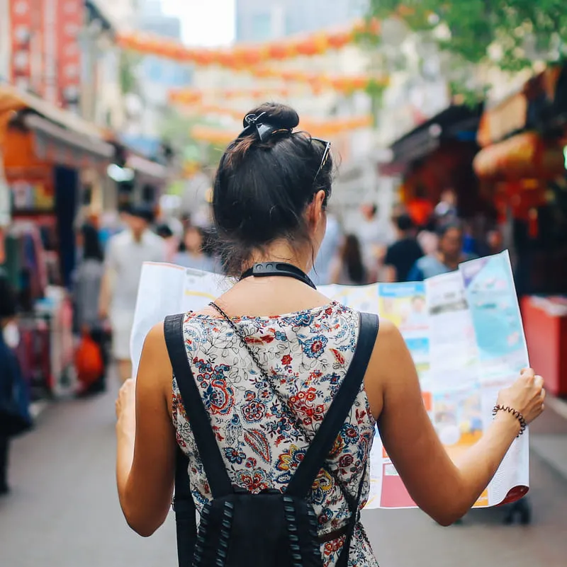 traveler looking at map