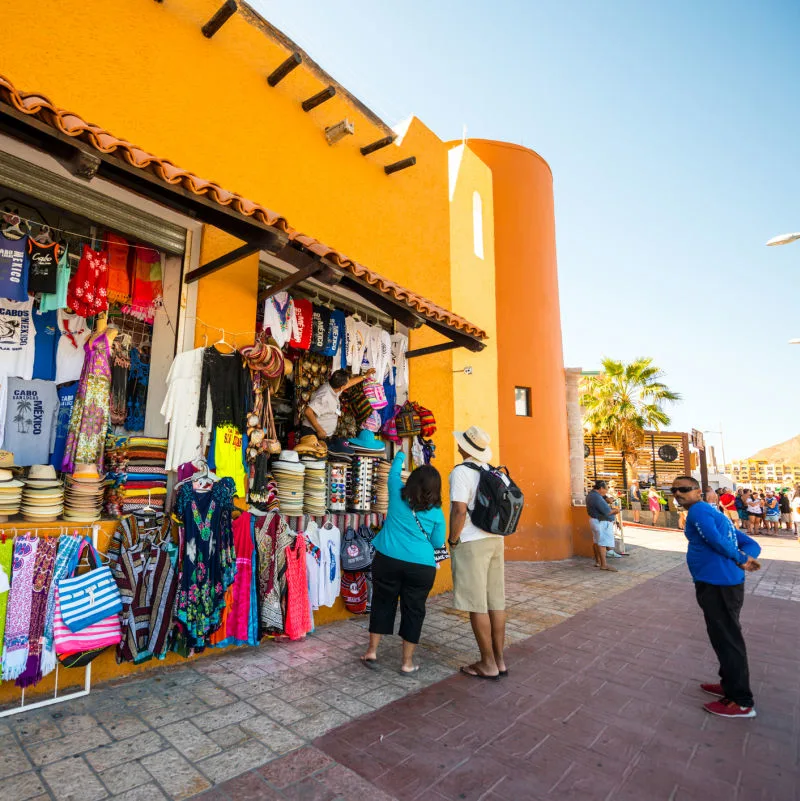 tourists picking out hats