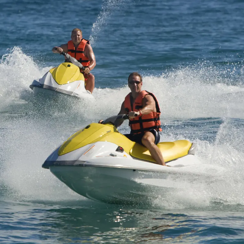 two men on jet skis