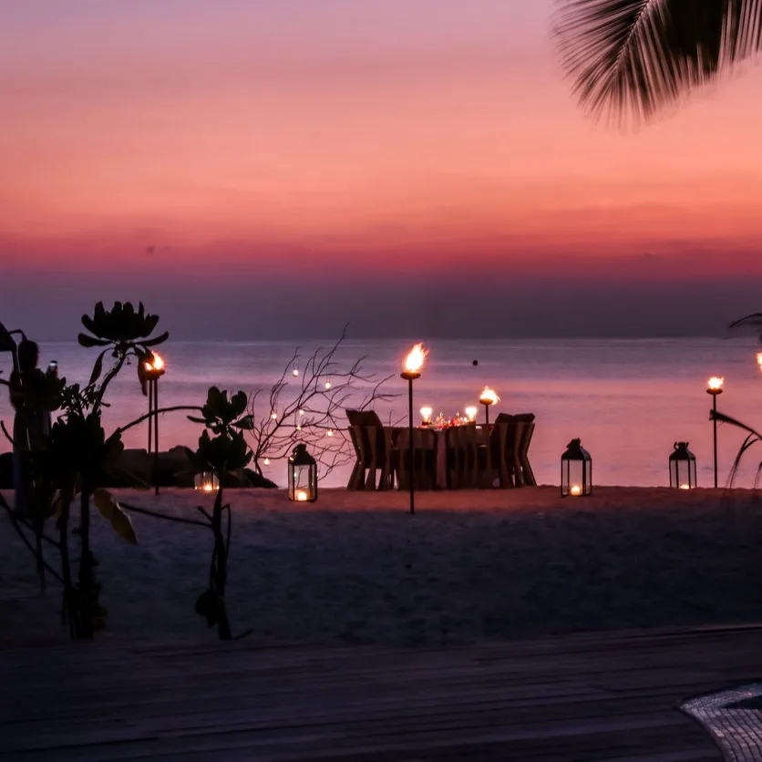 Romantic Maldivian Sunset Beach Dinner with candlelight