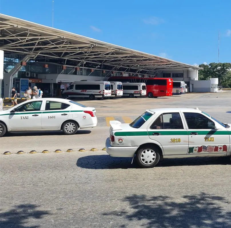 Taxis Near In a Bus Station Parking Lot