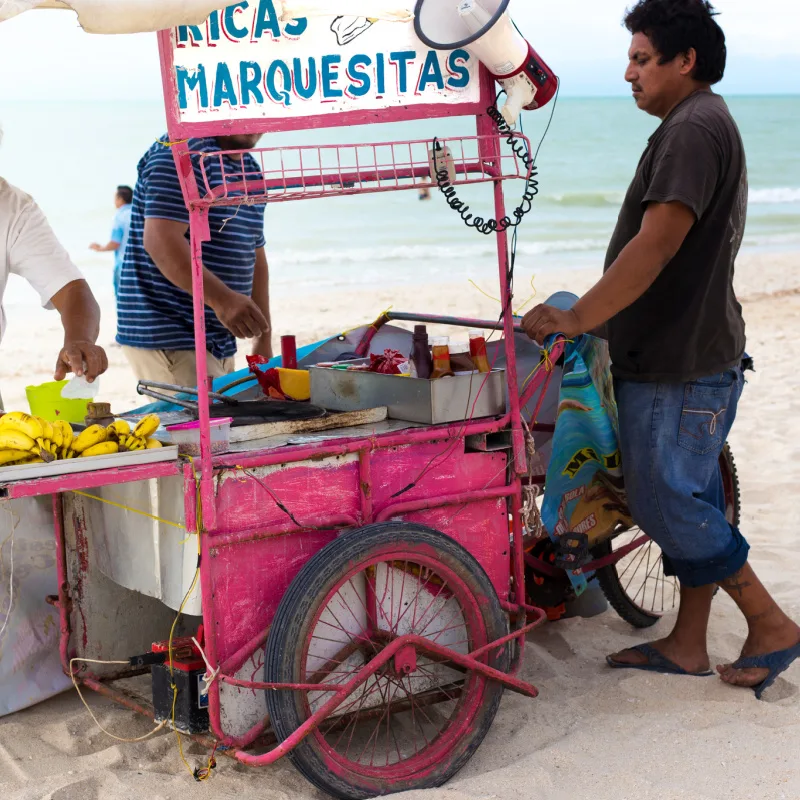 beach vendor with customers