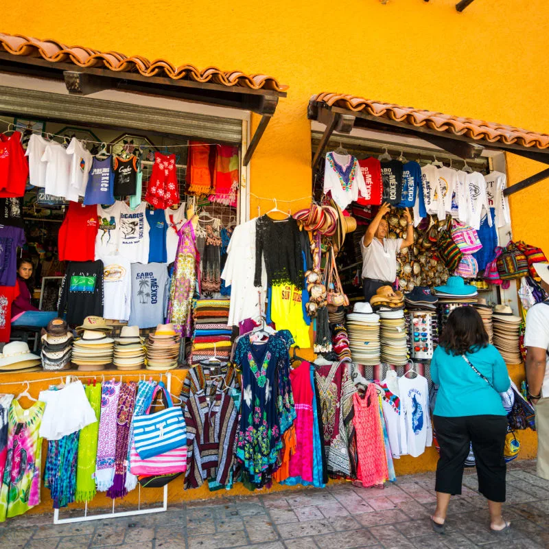 tourists shopping at vendor