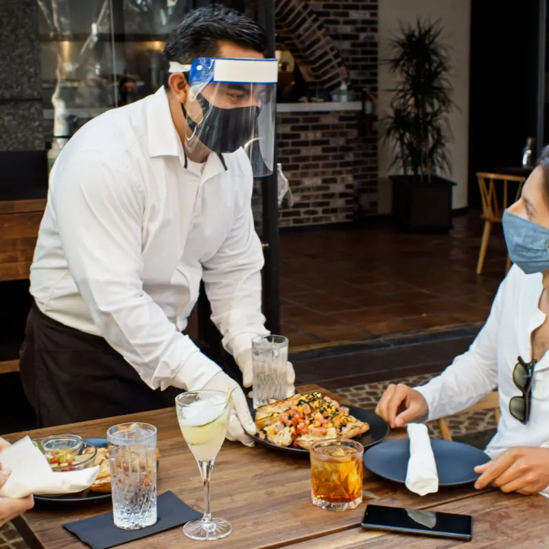 waiter wearing ppe