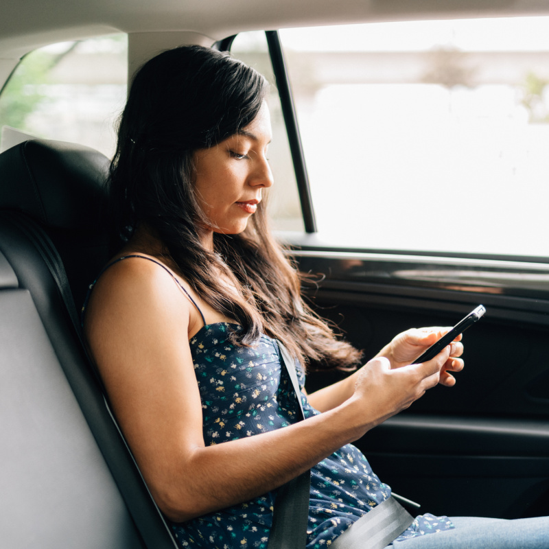 passenger riding in backseat