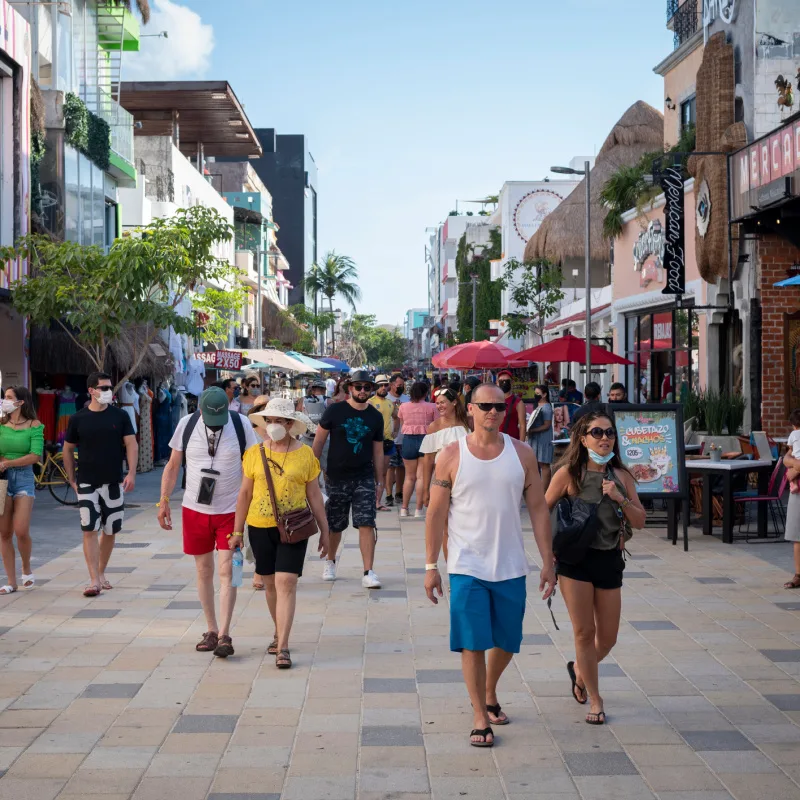 people walking in los cabos