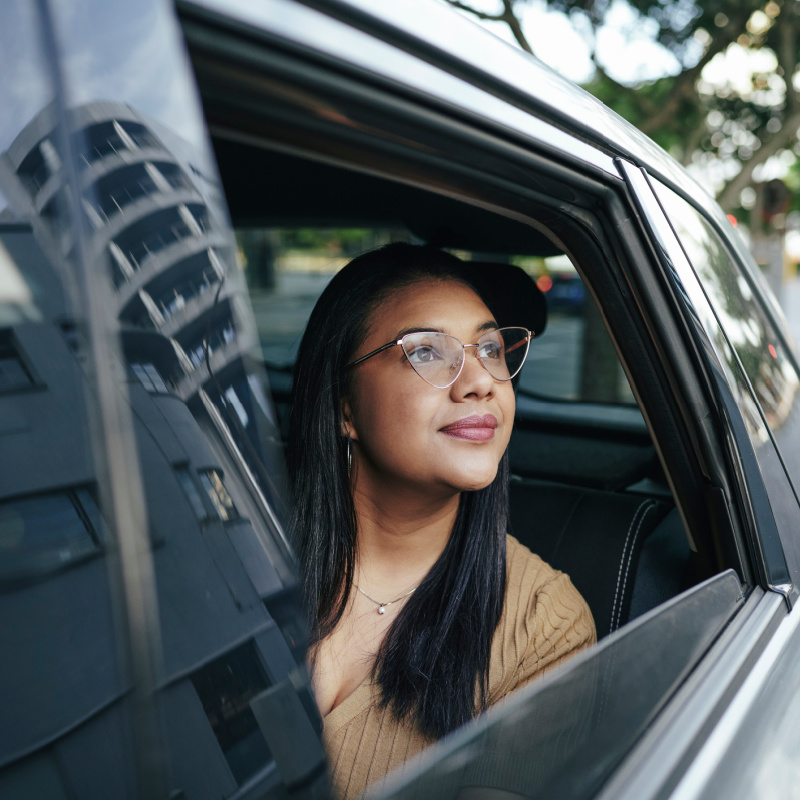 young woman enjoying uber ride