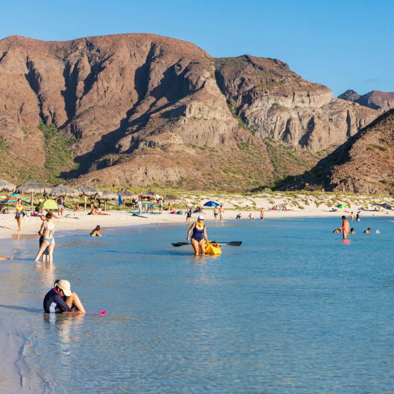 tourists at swimming at balandra beach