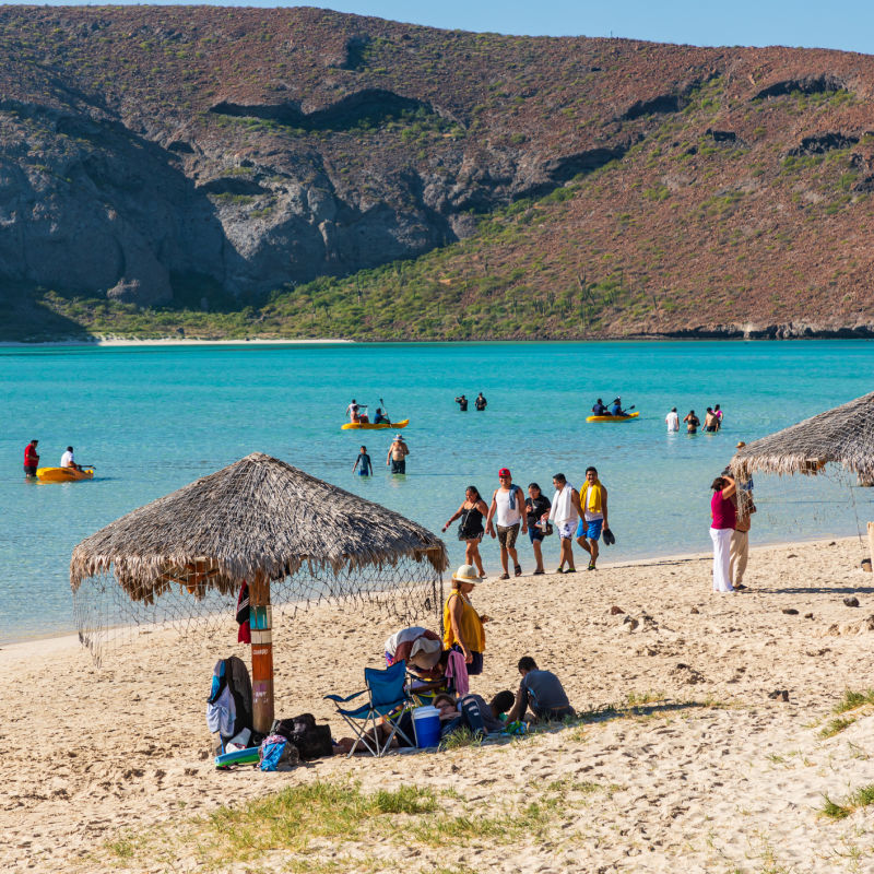 Tourists on Playa Balandra near Los Cabos
