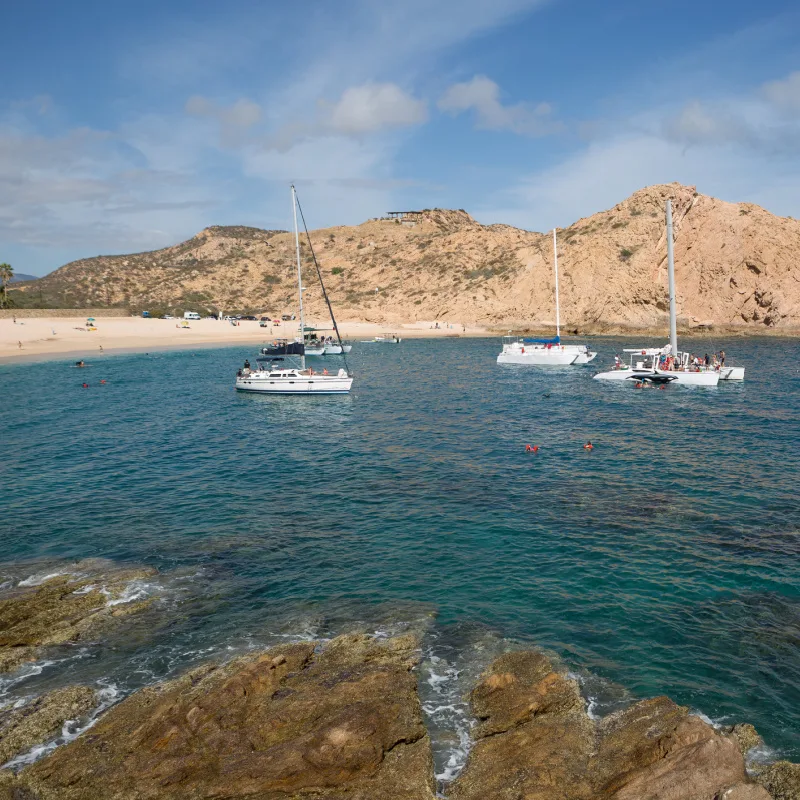 Boats on the water in Santa Maria Bay in Los Cabos, Mexico.