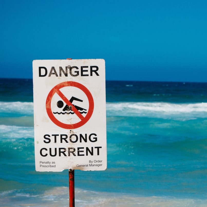 Danger sign on beach