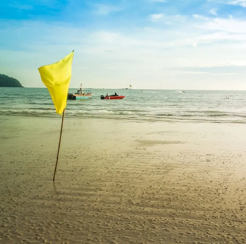 Yellow flag on beach