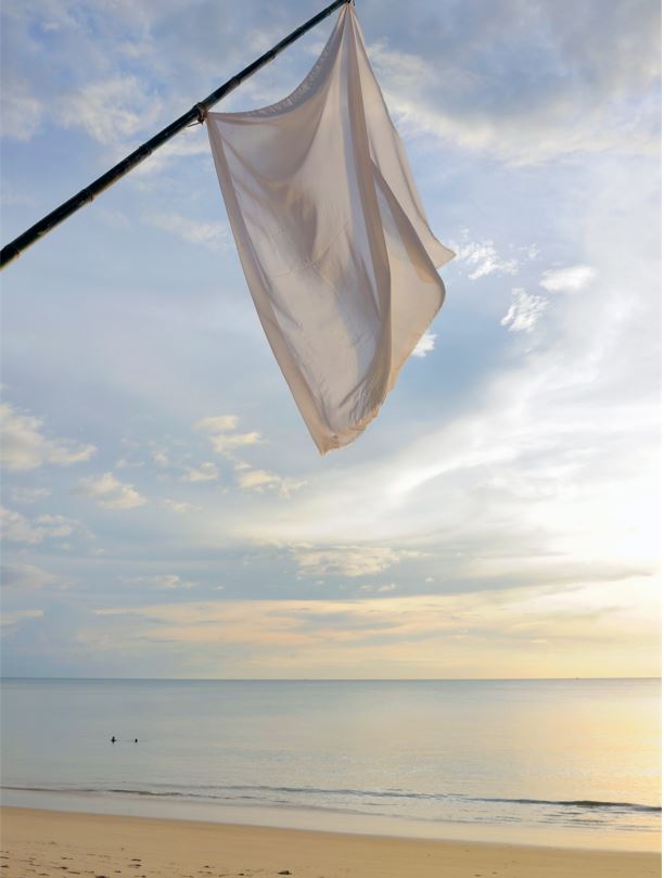 White Flag On Beach