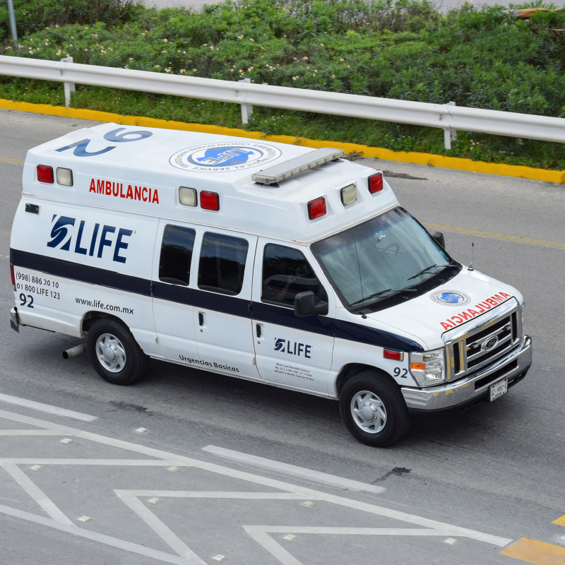 Ambulance driving down the road