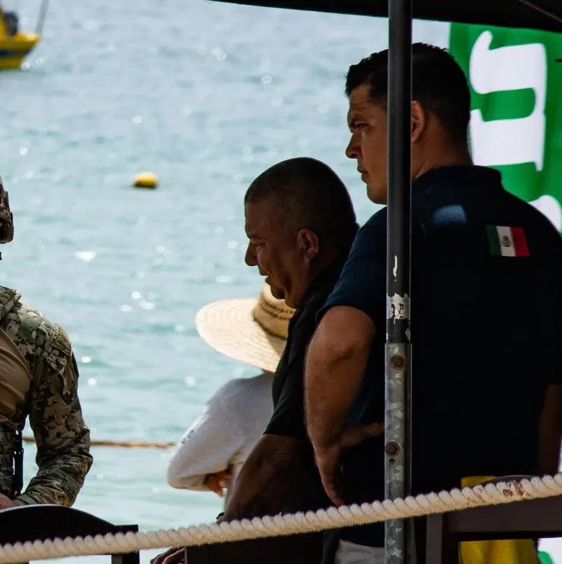 military on beach in cabo