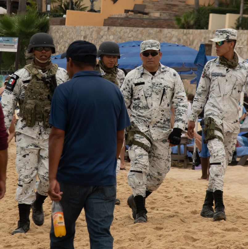Mexico security walking along the beach