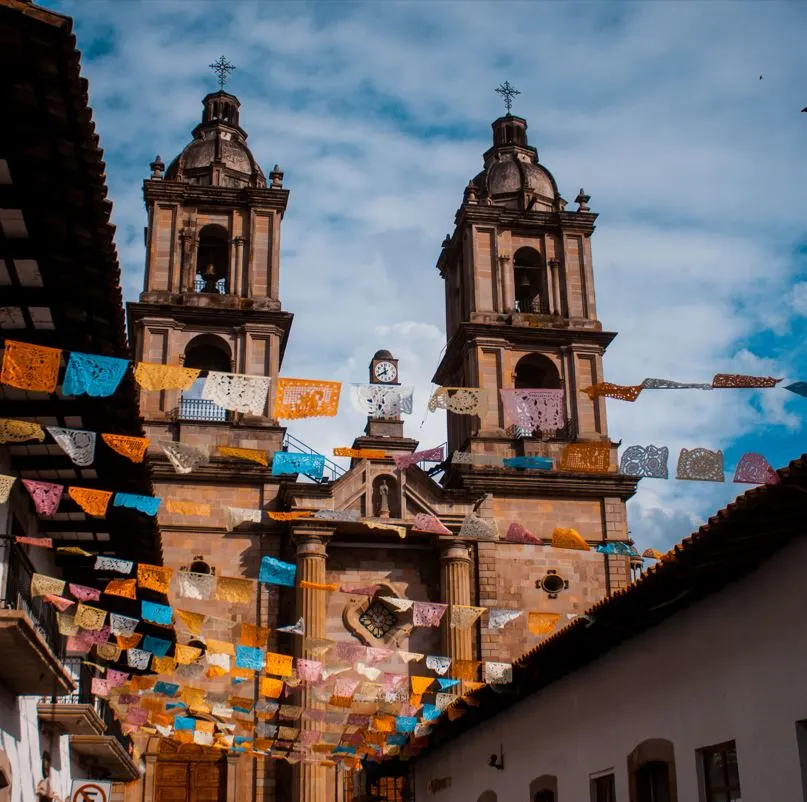 Church on street with colorful streamers