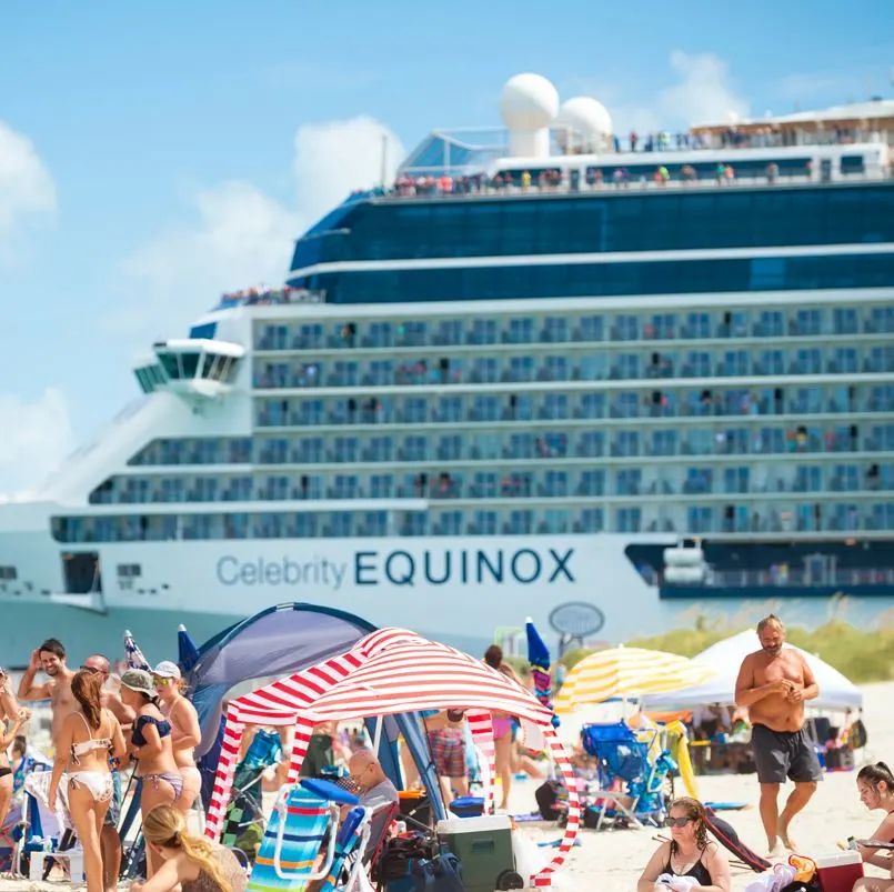 Cruise ship docked near beach