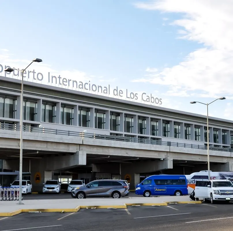 Los Cabos airport with shuttles in the front