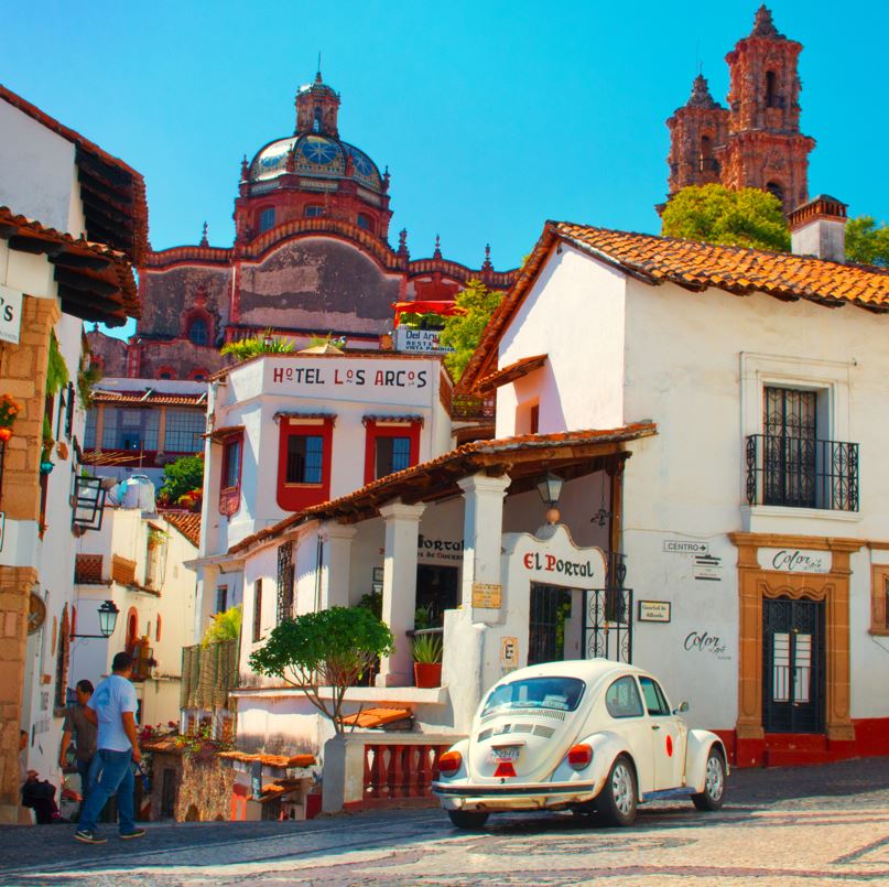 Small town in Mexico with cobblestone roads and church