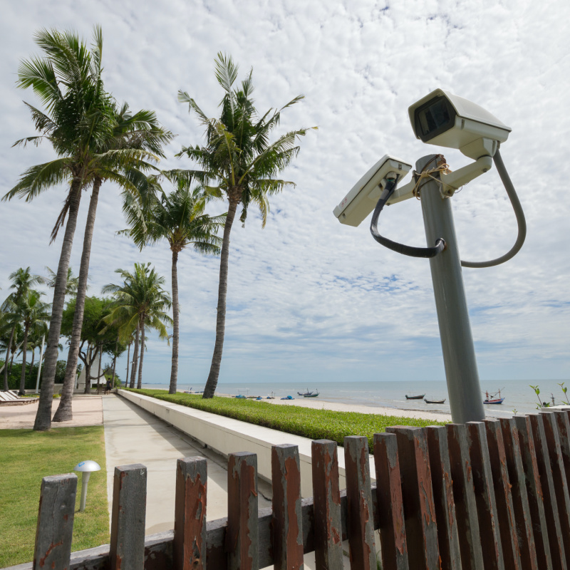 Security camera overlooking the boardwalk and the beach to help maintain security.