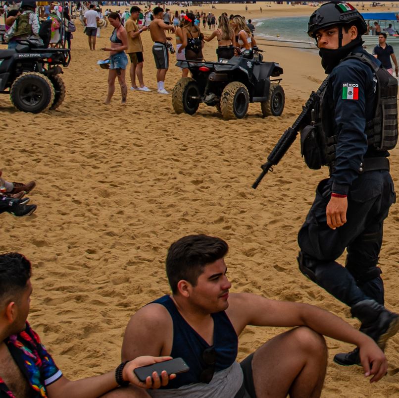 Police officer on the beach