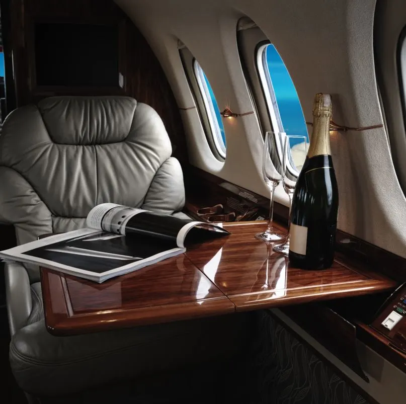 Private jet seat with champagne