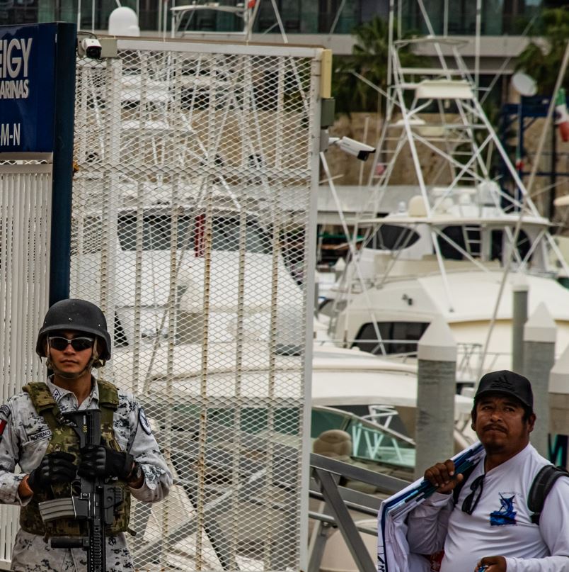 Marina police observing clothing vendor