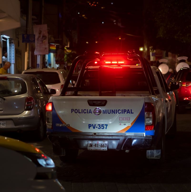 Municipal police patrol in truck at night