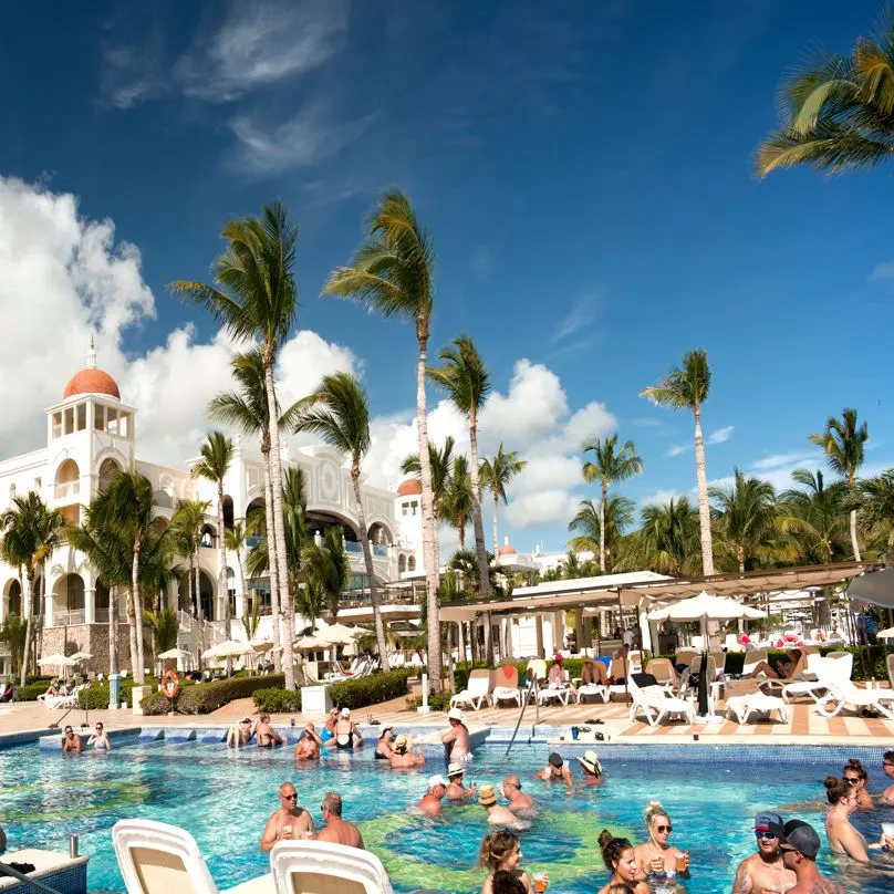 Tourists In Cabo Resort Pool