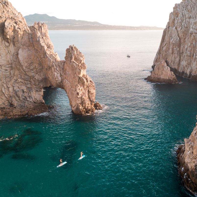 Tourists Paddling Near Los Cabos Arch