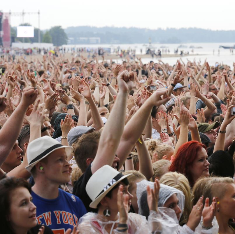 Crowd at a concert near the beach