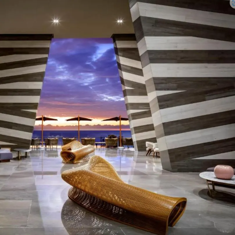 Ocean view with sunset from a lobby with modern decor