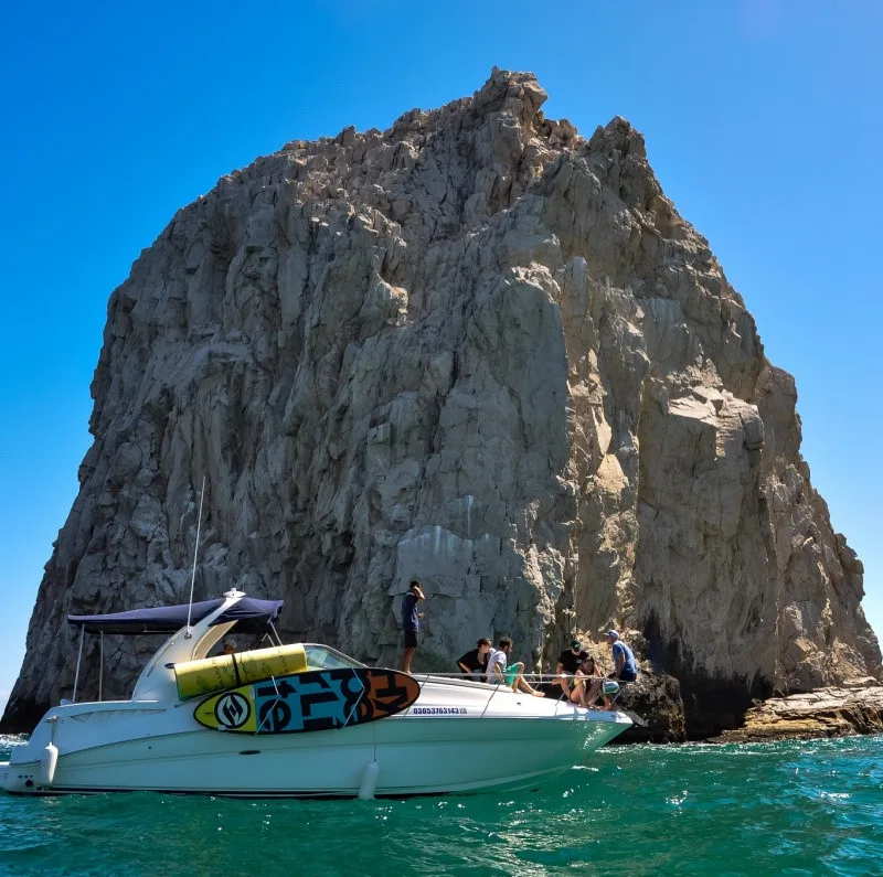 Boat near a famous Los Cabos rock formation