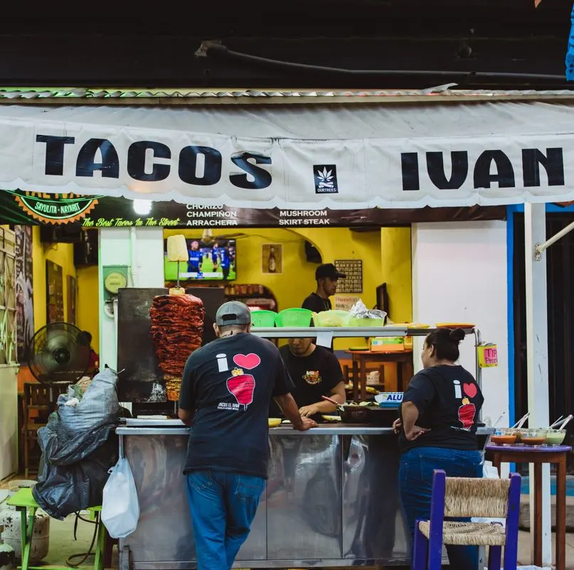 Outdoor Food Vendor with People in Line