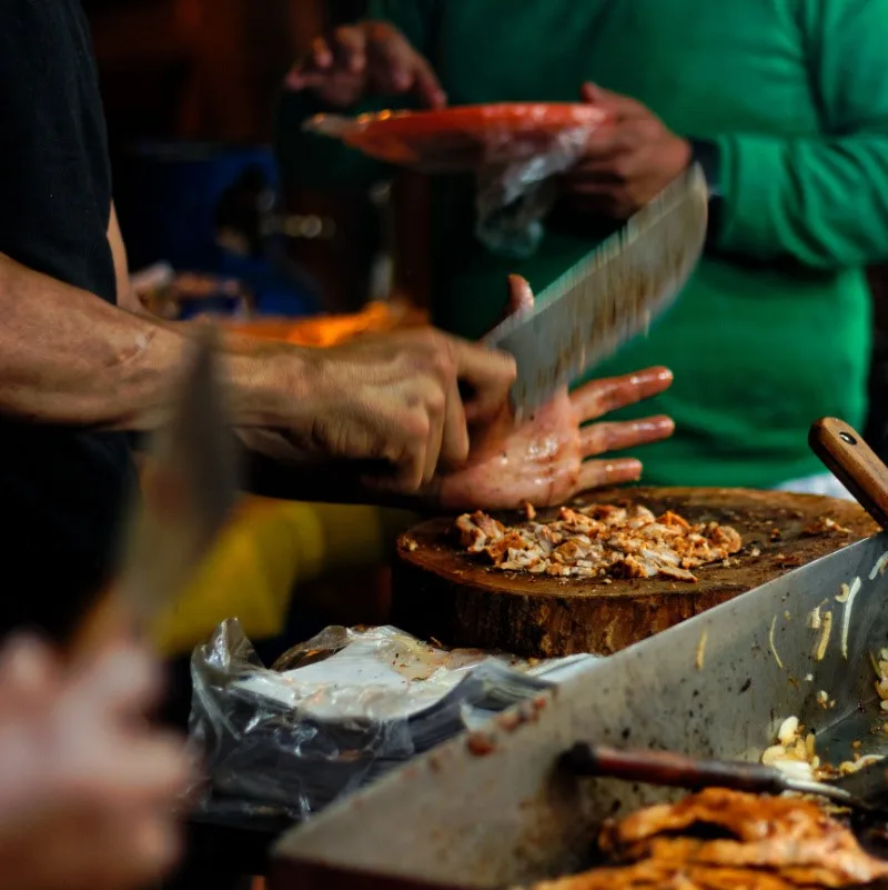 Food vendor preparing food in Mexico