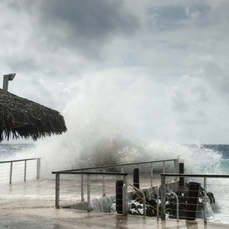 Waves hitting a dock during a strong storm