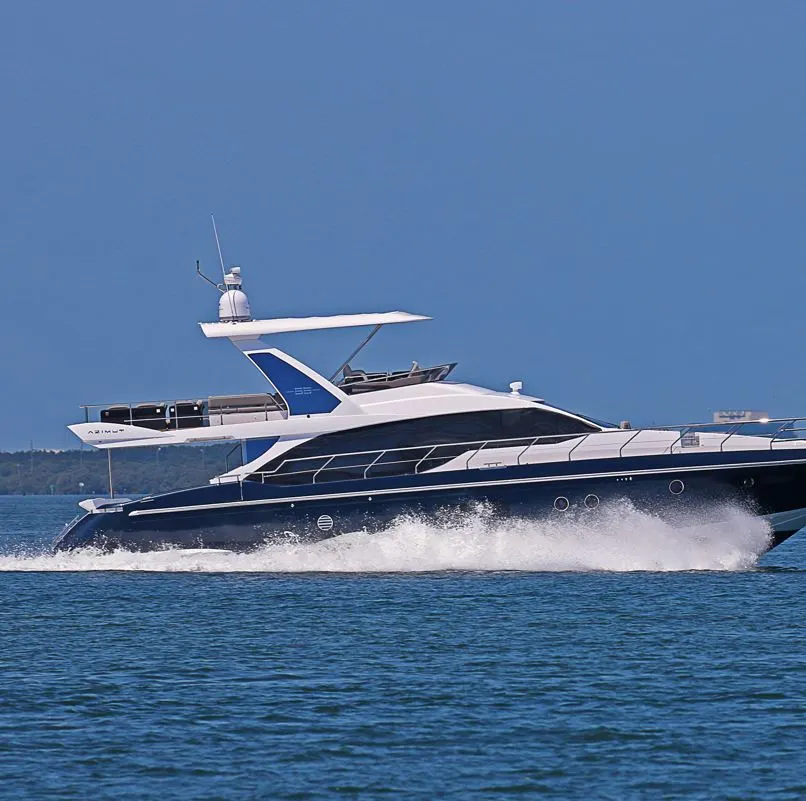 A rental yacht speeding through the waters of los cabos