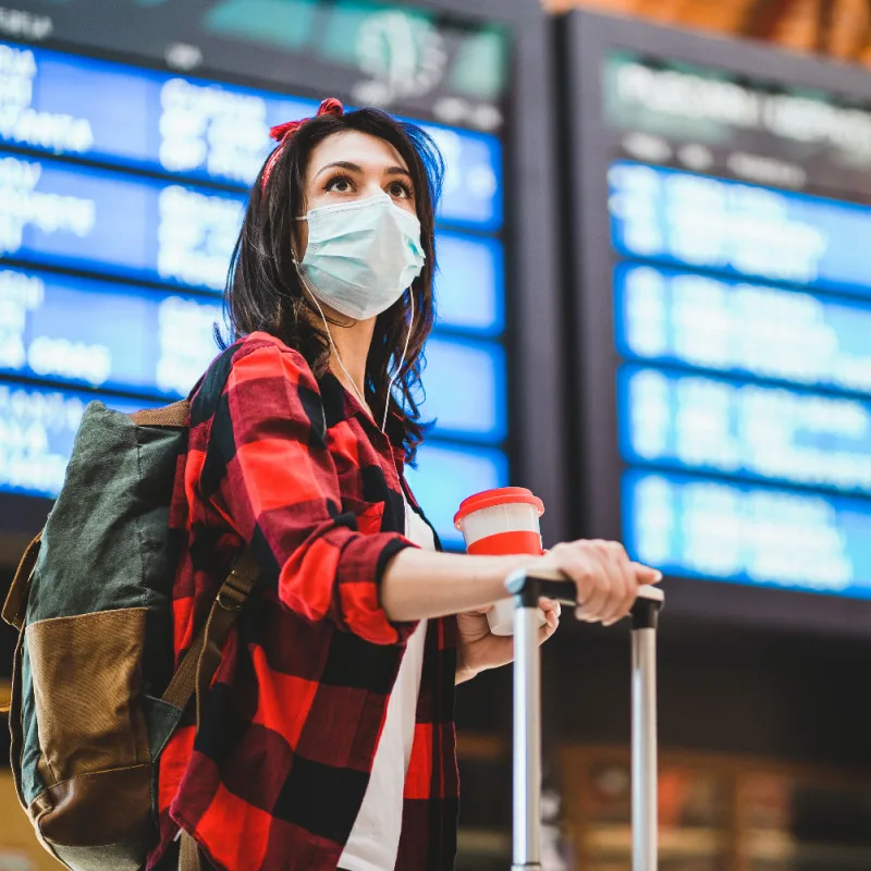 Passenger wearing mask at airport