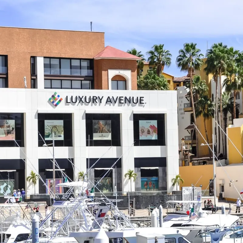 Luxury Avenue, a shopping center located in Los Cabos, with the marina in view.
