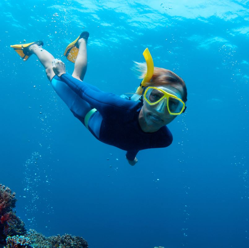 snorkeling with wet suit