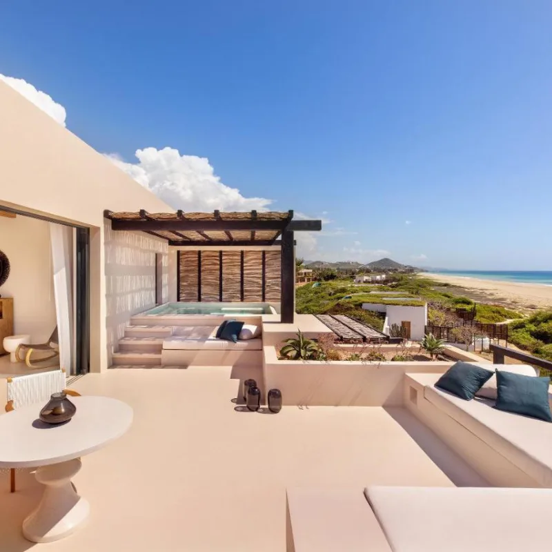 View of a private villas with plunge pooll, ourdoor seating and the beach at Rancho Pescadero Resort