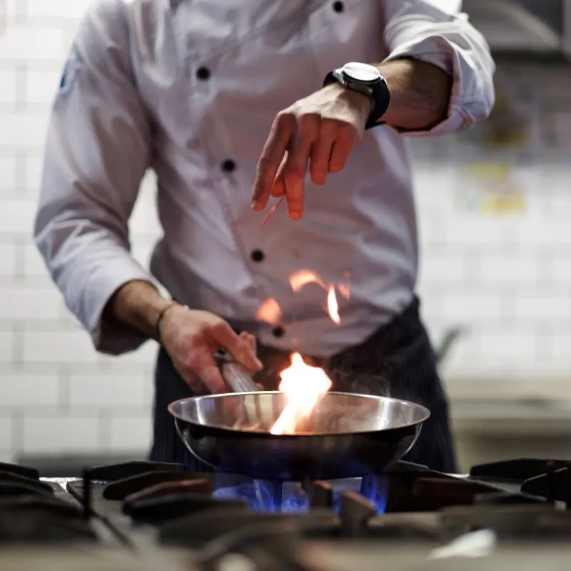 Chef preparing an upscale meal