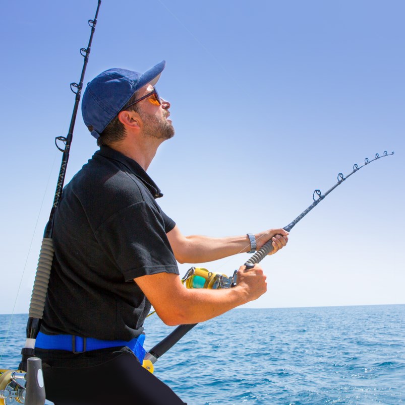A traveler fishing on a charter boat in Los Cabos