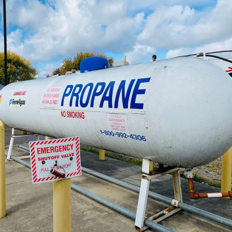Large propane tank storage container outdoors