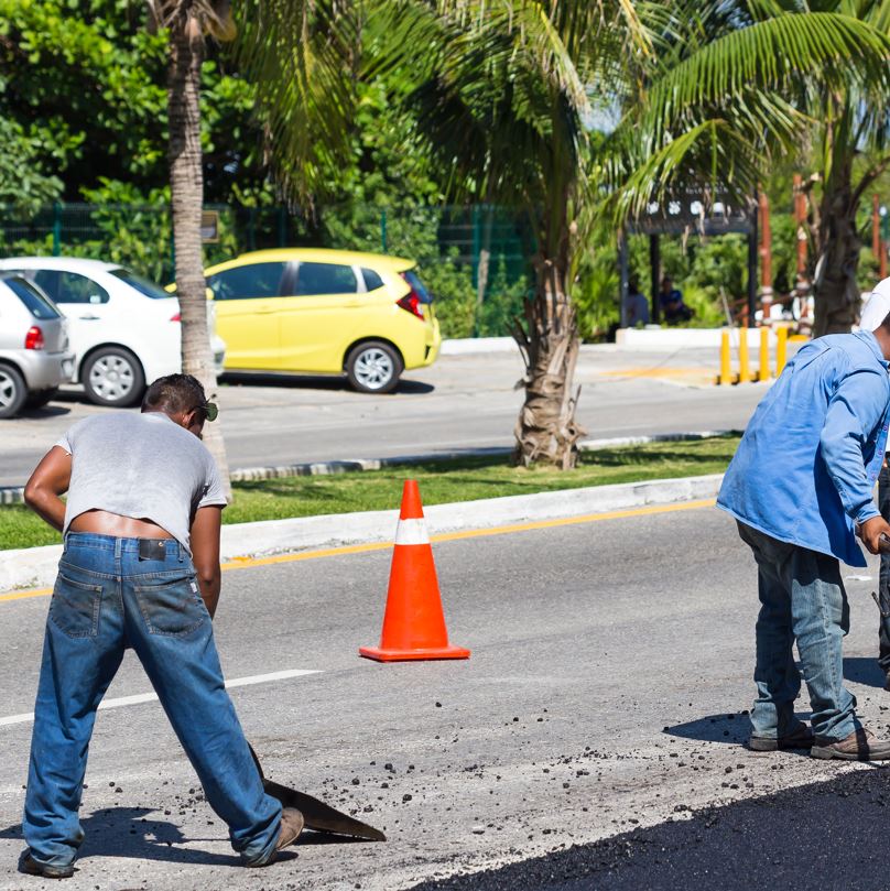 Reparing a road in a Mexican beach city