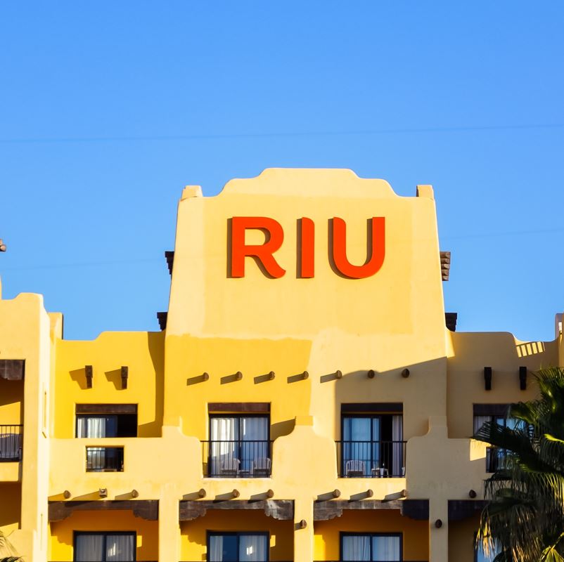 Riu Hotel Main Building With Traditional Red Letter Sign